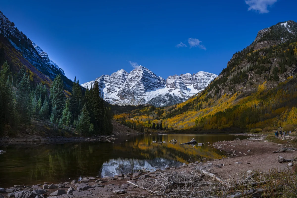 Maroon Bells Stewardship Shifts Amidst Federal Funding Crisis, Igniting Public Lands Privatization Debate.